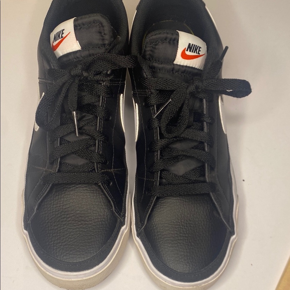 Nike Black Low-Top Sneakers with White Swoosh